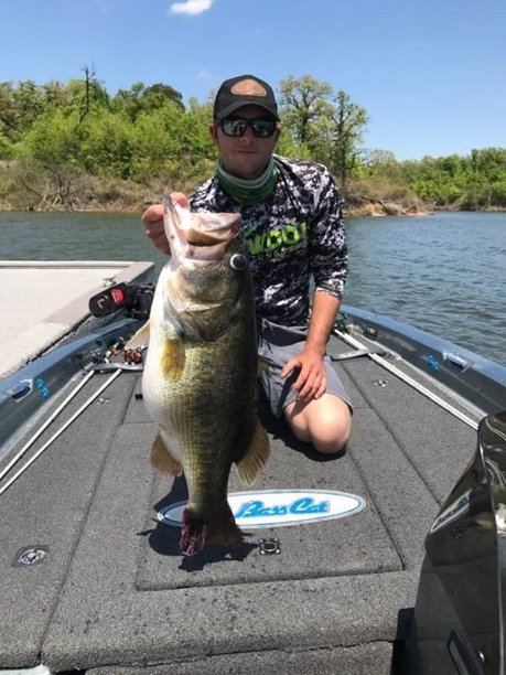 Austin Cranford of Norman caught this 14-pound largemouth bass at Arbuckle Lake last Sunday. The fish will be tied for the 12th biggest largemouth bass ever caught in the state, according to the Wildlife Department's top 20 list.jpg