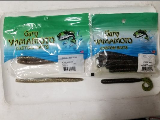 Few lure brands are as well-known and respected as&nbsp;Gary Yamamoto Custom Baits.&nbsp;Their Senko forever changed bass fishing and is one of the best lures of all times.
Their Zako has become the go-to ChatterBait trailer. The Hula Grub and Double Tail Grub are staples for football heads and as a jig trailer. The list goes on and on with their successful baits.
But, they make quite a few other products, including some that are kept quiet by anglers in the know. Here are three lures that are catching bass but maybe not getting the attention they deserve.
Roy Hawk | &ldquo;Stretch 40&rdquo; Grub
The &ldquo;Stretch 40&rdquo; is a unique bait that is a cross between a Senko and a grub. It has a similar length and appearance of the original Senko, but it has a small curly tail at the end. Roy Hawk has had success with it rigged a variety of ways and across the country.
&ldquo;Overall, it is just super versatile. I&rsquo;ve flipped it, fished it weightless, on a Carolina-rig, and on a split shot,&rdquo; Hawk began. &ldquo;I have friends that drop-shot it all the time, and they fish it dragging on the bottom and &lsquo;strolling&rsquo; it. They do great fishing it that way.&rdquo;
So what makes this bait so unique? Hawk says it comes down to the profile.
&ldquo;It is basically a four-inch Senko with a curly tail, but the tail is small. Most baits that size have a large curl or ribbon tail, and this is much different, and I&rsquo;d say more lively,&rdquo; he said. &ldquo;It is just like bass food, you could throw a bunch in the water, and they would look good enough that bass would swim over and eat them.&rdquo;
READ RELATED: 5 Baits Roy Hawk Took Across the Country