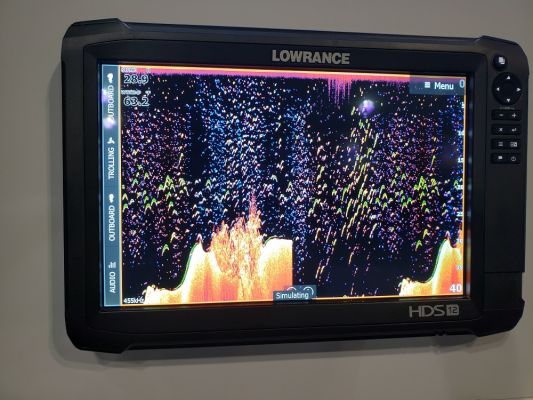 2018 Software Update
Earlier this season, Lowrance added a new software update for the HDS Carbon, Gen3 and Elite-Ti units. Included in this enhancement were improvements for their mapping, color options, and the new FishReveal technology.
FishReveal was the biggest news in this new software update as it makes it much easier to see fish on with DownScan. It makes simple to view fish thanks to the bright colors and fish that pop out on the screen.
FishReveal combines CHIRP sonar images of fish with high-resolution views of the bottom. They do this by boosting sonar returns and minimizing weaker ones which show better separation of targets like larger fish and schools of baitfish.
For the mapping portion of the update, they added &ldquo;Easy Routing&rdquo; and the ability to use Navionics Dock-to-Dock Autorouting. The new C-MAP navigation palette also makes it easier to access the features of C-MAP.
