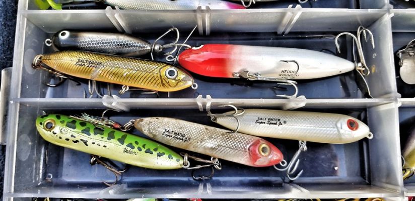 3 Tricks for More Bass with a Heddon Spook
One of the best topwater lures of all time is the Heddon Zara Spook. It&rsquo;s been so successful that it has become the &ldquo;Kleenex,&rdquo; or the &ldquo;Band-Aid&rdquo; of the lure world where now any walking bait is often simply called a &ldquo;Spook&rdquo; regardless of the brand. It&rsquo;s been catching them for 80-years and will continue to do so.
The basic premise of the bait is to get it to &ldquo;walk-the-dog&rdquo; along the surface. This action is a tried and true way to catch bass, but there are a few tricks you can add to catch even more.
Alton Jones, Alton Jones, Jr., and Jason Christie shared how they modify and change their favorite topwater walking bait.