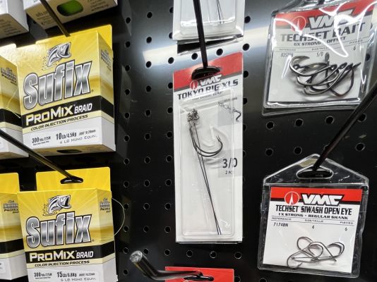 VMC Tokyo Rig 5-inch Drop-Wire
The Tokyo Rig has become a staple rig for many bass anglers and the team at VMC just released another version of it. Instead of the standard wire, the new 5-inch version is twice as long. It was developed for anglers who wanted their bait a little higher off of the bottom and will greatly help those fishing soft and silted bottoms, where the previous version would sink too far into the bottom.
The new version features a heavy-duty wide gap XLS model VMC hook and anglers can select the right size hook for their favorite soft bait and use whatever size tungsten weight they prefer. Retail cost for a pack of two is $4.99.