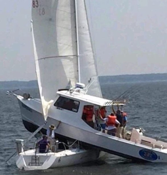 two boats collide sailboat and fishing boat accident.jpg