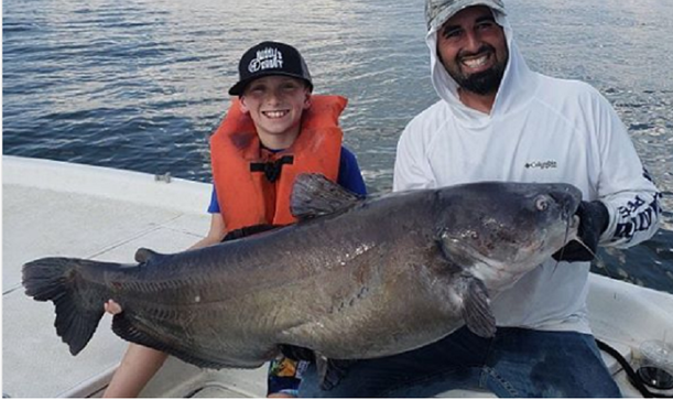 10 year old Texas boy breaks lake conroe catfish record.png