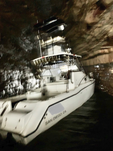 Anglers Rescued After Boat Plows Into Coastal Cave.png