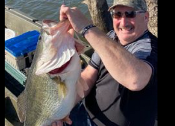 16.75 largemouth bass caught in kayak.png